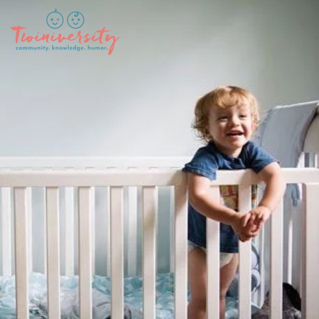 toddler standing in his crib