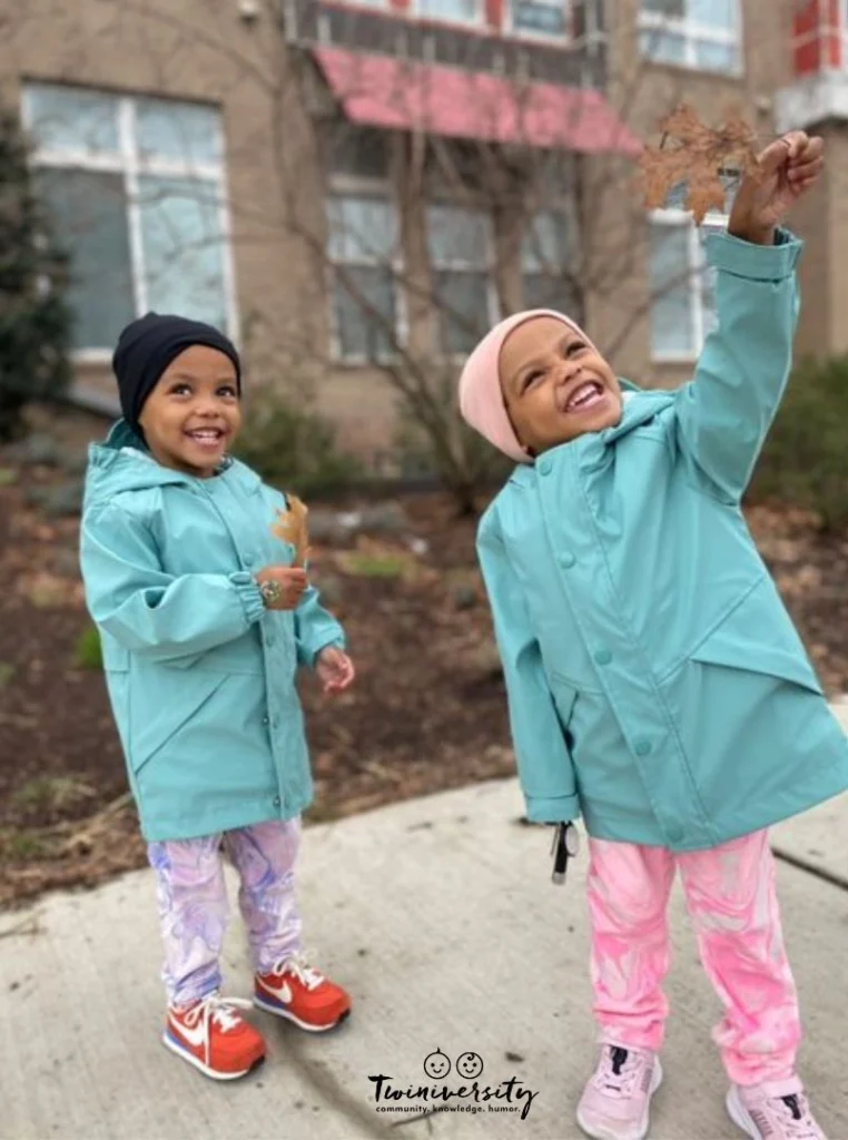 Twin girls playing outside