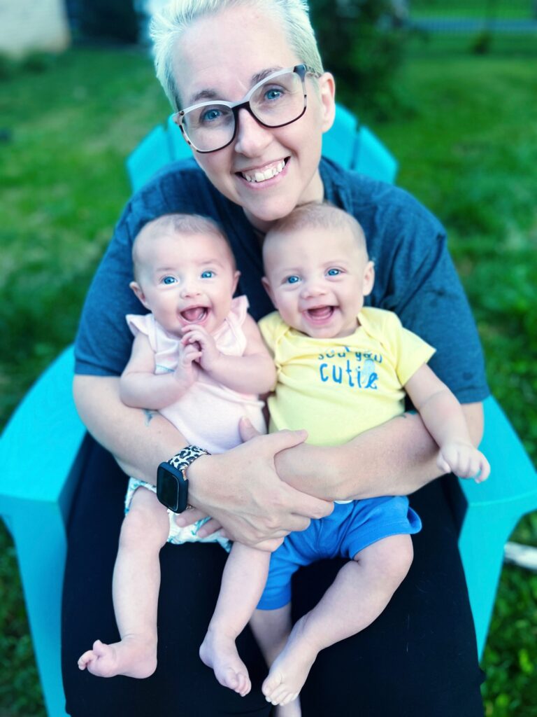 twin mom holding her twins