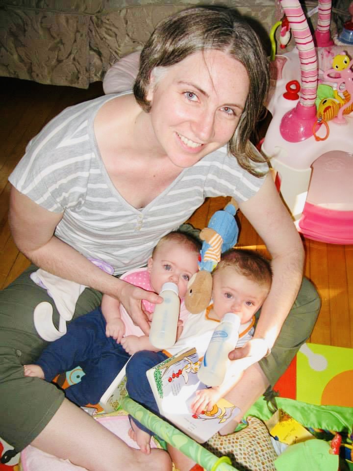 twin mom feeding twins