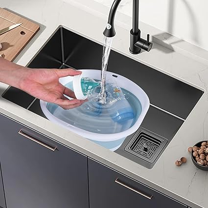 cleaning baby bottles in a wash basin