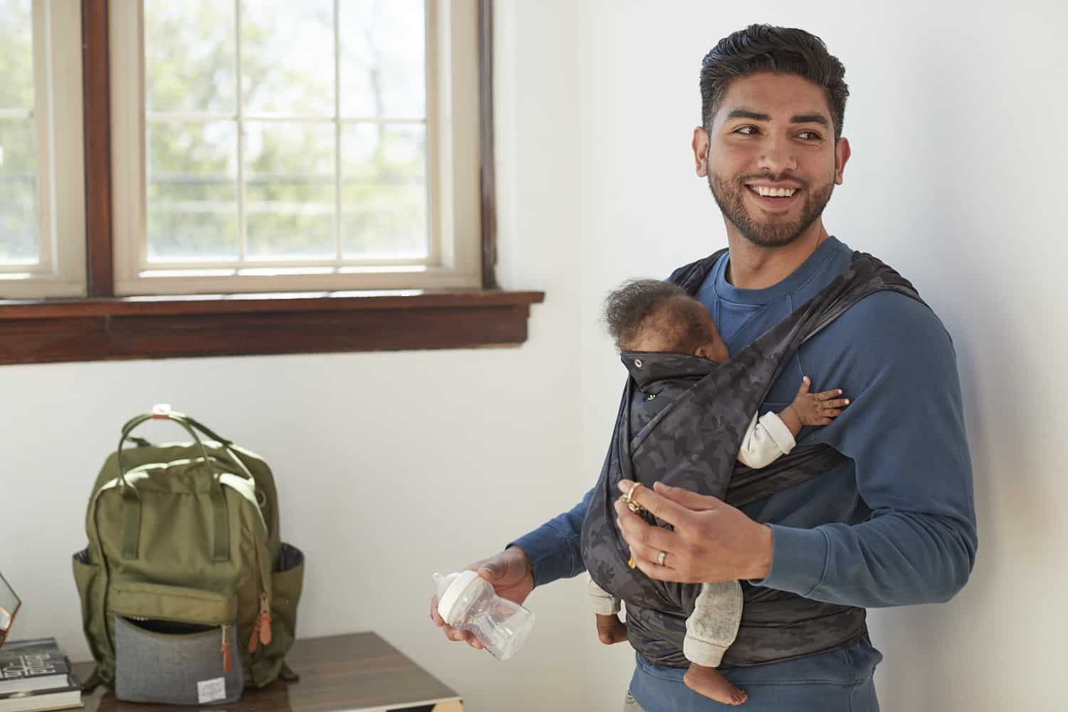 dad wearing baby