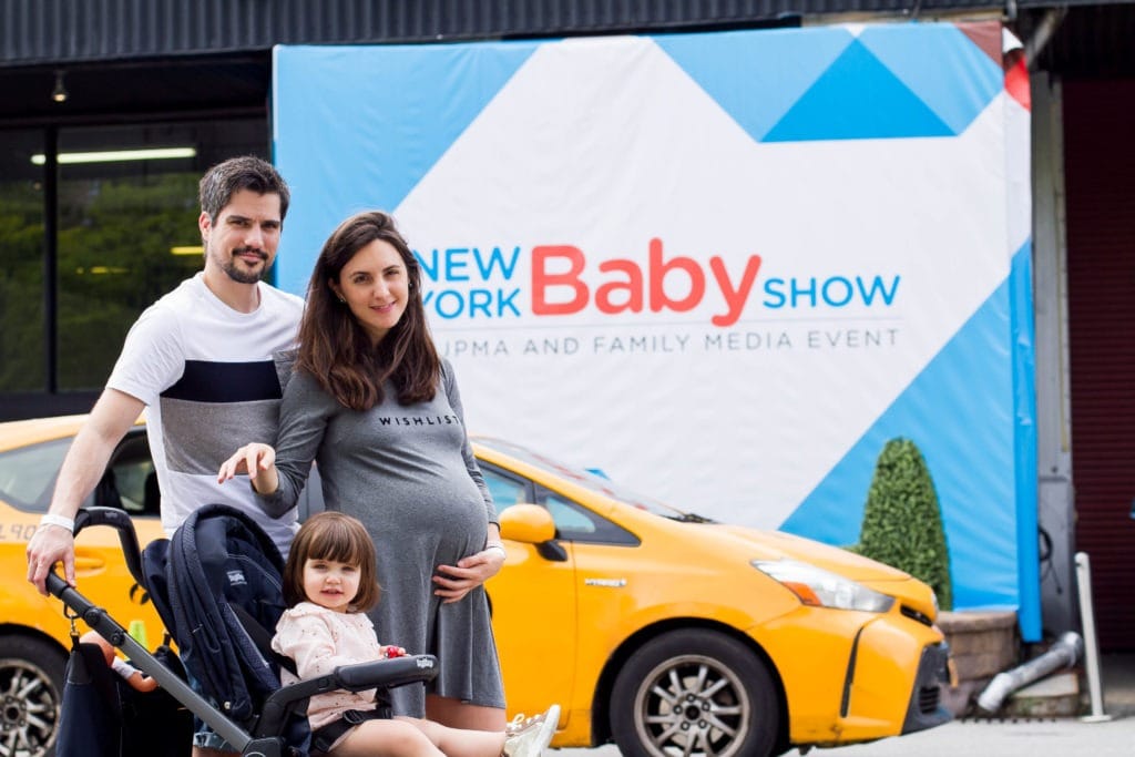 couple and baby at new york baby show